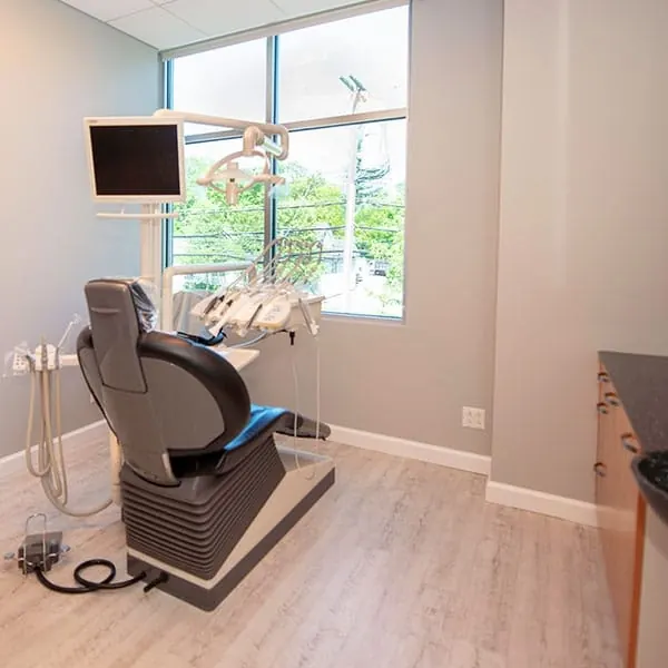 A treatment room with a window onto Mamaroneck Avenue.